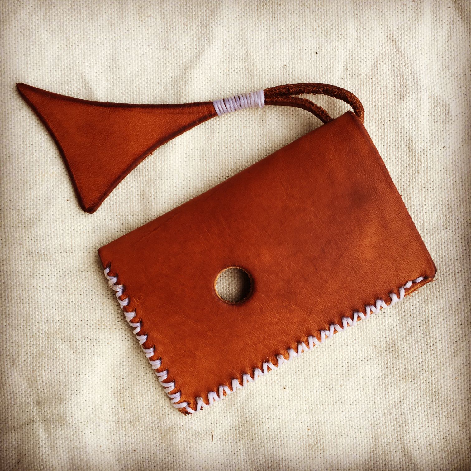 Card wallet with a tail